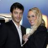 Elodie Gossuin et son mari Bertrand Lacherie au lancement du BMWi Borne Electric Tour à Paris. Le 3 avril 2013. La Miss attend son 3e enfant.