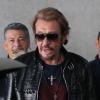 Johnny et son épouse Laeticia Hallyday à Paris le 21 mai 2013.