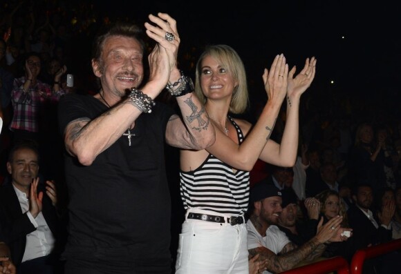 Johnny et Laeticia Hallyday assistent au concert de Patrick Bruel à Bercy. Paris, le 22 juin 2013.