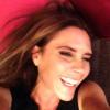 Victoria Beckham, hilare, prise en photo par David, sur Facebook, le 23 juin 2013.