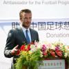 David Beckham, ambassadeur du football chinois, lors d'une cérémonie de charité, le 17 juin 2013, à Pékin.