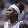 Serena Williams a rapidement rangé sa crinière en chignon durant son premier match de Wimbledon face à Mandy Minella le 25 juin 2013 à Londres