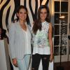 Malika Ménard et Laetitia Bleger lors de la présentation du sac de Laury Thilleman pour la marque La Halle à Paris, le 27 juin 2013