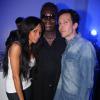 Mia Frye avec son mari Michel Ressiga et Magloire à la soirée de lancement de la collection Sam-Rone prêt-à-porter printemps/été 2014-2015, à Paris, le 7 juillet 2013.