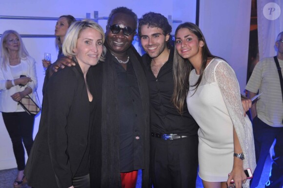 Magloire, Sandrine Touboul et Julian Sam-Rone à la soirée de lancement de la collection Sam-Rone prêt-à-porter printemps/été 2014-2015, à Paris, le 7 juillet 2013.