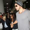 Eva Longoria et Ernesto Arguello arrivent à l'aéroport de Los Angeles, le 9 juillet 2013.