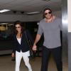 L'actrice Eva Longoria et Ernesto Arguello arrivent à l'aéroport de Los Angeles, le 9 juillet 2013.