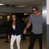 Eva Longoria et Ernesto Arguello arrivent à l'aéroport de Los Angeles, le 9 juillet 2013.