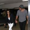 Eva Longoria et Ernesto Arguello arrivent à l'aéroport de Los Angeles, le 9 juillet 2013.