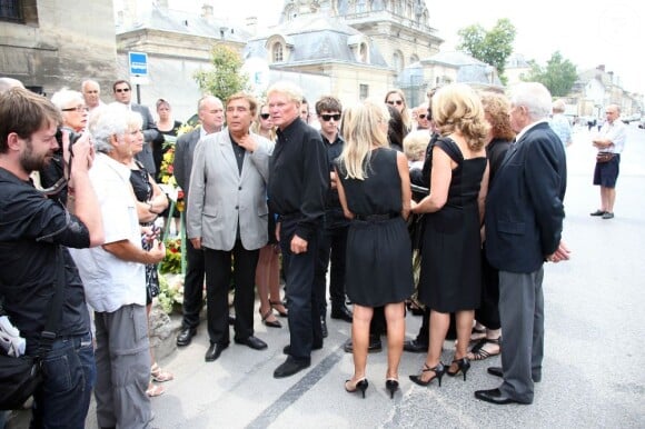 La famille d'André Verchuren assiste à ses obsèques à Chantilly le 17 juillet 2013.