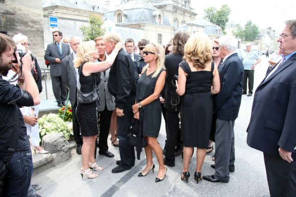 La famille d'André Verchuren assiste à ses obsèques à Chantilly le 17 juillet 2013.