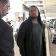 Kanye West a une nouvelle fois fait parlé de lui à la sortie de l'aéroport LAX de Los Angeles, le 19 juillet 2013.