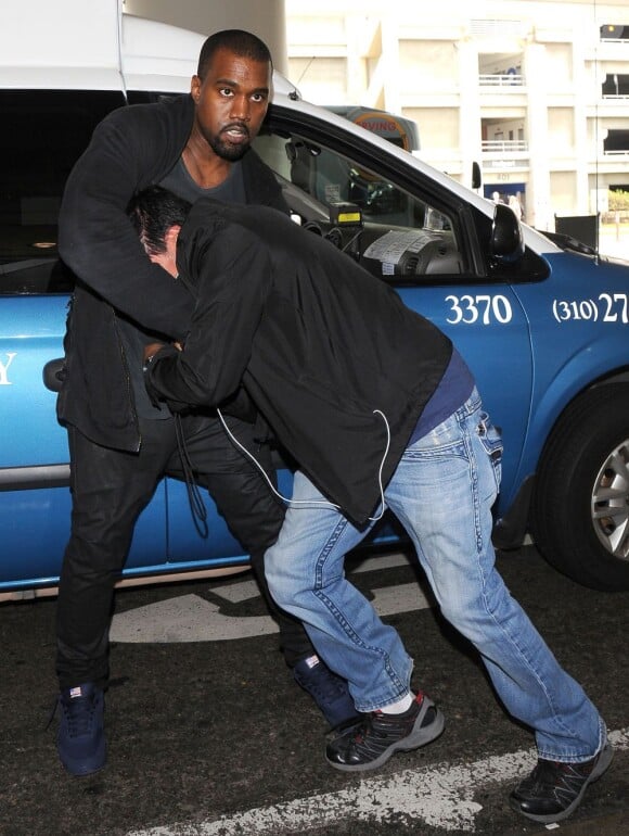 Kanye West a fait des émules à son arrivée à l'aéroport LAX de Los Angeles, le 19 juillet 2013.