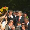 Bain de foule pour le roi Philippe de Belgique au parc royal à Bruxelles, le 21 juillet 2013.