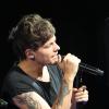 Louis Tomlinson du groupe One Direction au Verizon Center de Washington, le 23 juin 2013.