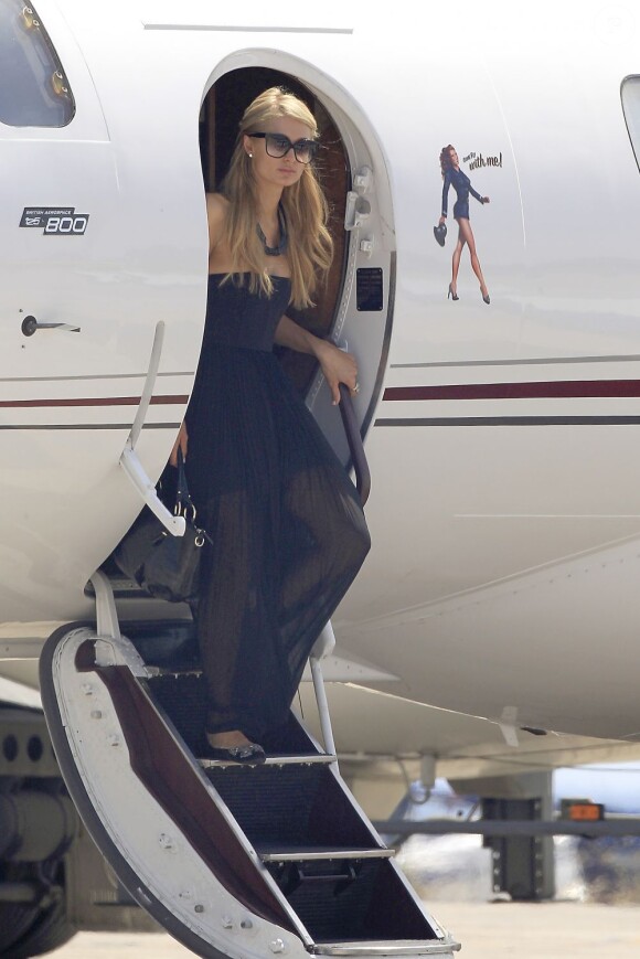 Paris Hilton arrive à Ibiza , le 3 août 2013.