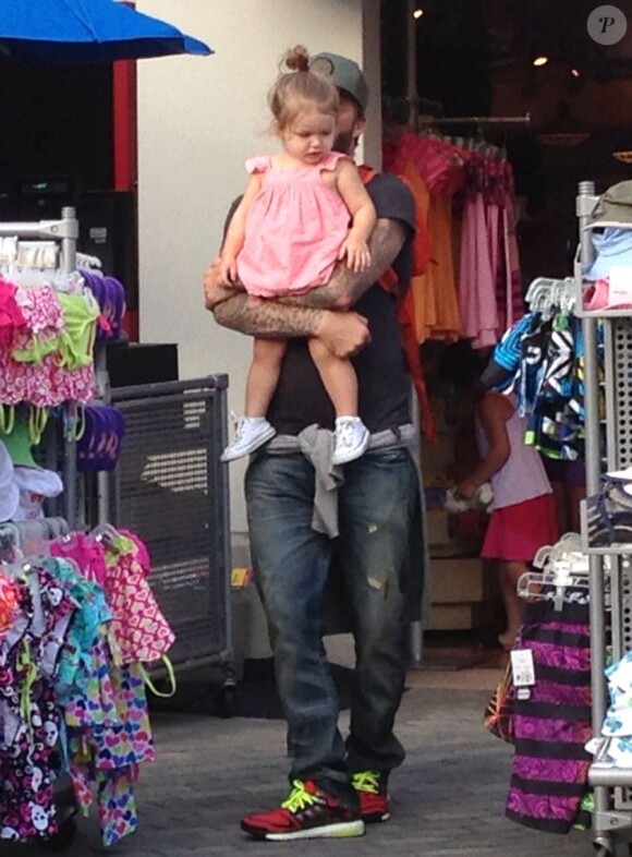 David Beckham, papa poule avec la petite Harper au parc Legoland de Carlsbad en Californie le 6 août 2013