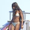 Naomi Campbell, 43 ans et craquante en bikini, profite de vacances avec des amis a Formentera. Le 11 août 2013.