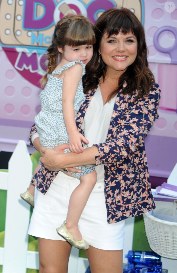 Tiffani Thiessen et sa jolie fille Harper Smith à l'événement Disney Doc Mobile Tour, à New York, le 21 août 2013.