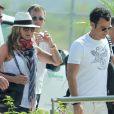 Jennifer Aniston et Justin Theroux arrivent à l'aéroport de Cabo au Mexique, le 25 août 2013.