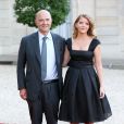 Pierre Moscovici et sa jeune compagne Marie-Charline Pacquot lors d'un dîner d'Etat à l'Elysée le 3 septembre 2013.