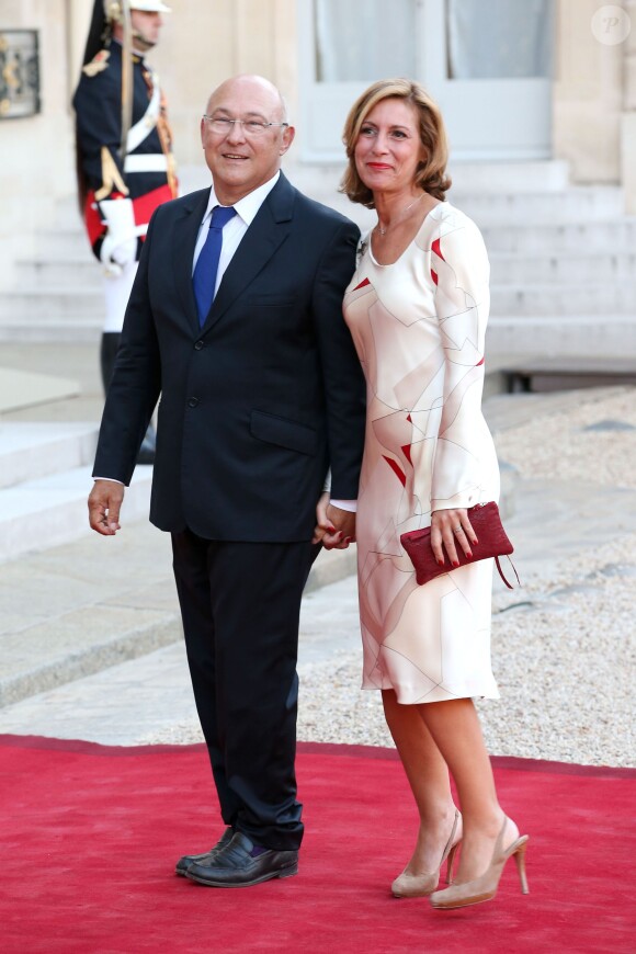 Michel Sapin et sa femme Valérie lors d'un dîner d'Etat à l'Elysée le 3 septembre 2013.