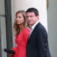 Manuel Valls et sa femme Anne Gravoin lors d'un dîner d'Etat à l'Elysée le 3 septembre 2013.