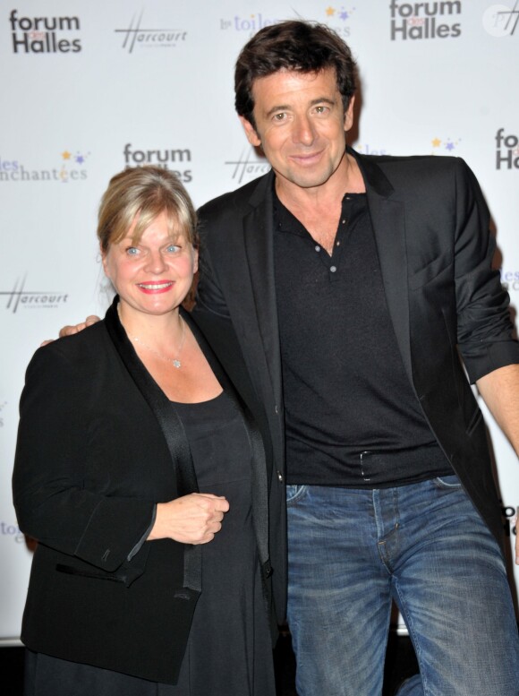 Patrick Bruel et Isabelle Nanty, parrain et marraine, inauguraient avec joie l'expo photo Stars parmi les stars organisée par le Studio Harcourt et le Forum des Halles au profit de l'association Les Toiles Enchantées, le 19 septembre 2013 à Paris.