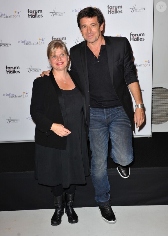 Patrick Bruel et Isabelle Nanty, parrain et marraine, inauguraient avec joie l'expo photo Stars parmi les stars organisée par le Studio Harcourt et le Forum des Halles au profit de l'association Les Toiles Enchantées, le 19 septembre 2013 à Paris.