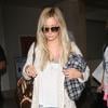Ashley Tisdale arrive à l'aéroport de Los Angeles, le 5 septembre 2013.