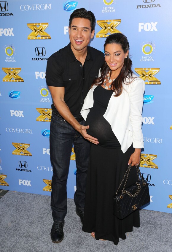 Mario Lopez et sa femme Courtney, enceinte, à la première de la saison 3 de "The X Factor" à West Hollywood, le 5 septembre 2013.