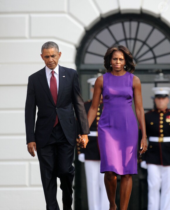 Barack et Michelle Obama rendent hommage aux victimes des attentats du World Trade Center à la Maison Blanche le 11 septembre 2013.