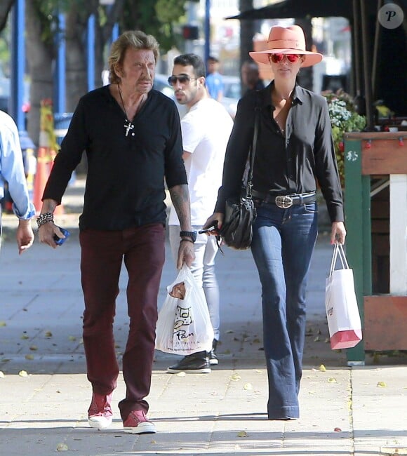 Exclusif - Johnny Hallyday et sa femme Laeticia accompagnent leurs filles Jade et Joy pour la rentrée des classes à Pacific Palisades, le 9 septembre 2013.