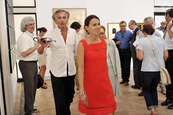 BHL et Aurélie Filippetti, la ministre de la Culture, visitent l'exposition "Les Aventures de la Vérité" qui est installée du 29 juin au 11 novembre 2013 à la célèbre Fondation Maeght sous l'impulsion du philosophe et écrivain francais Bernard-Henri Lévy commissaire de l'exposition. Le 27 juillet 2013 à Saint-Paul-de-Vence.