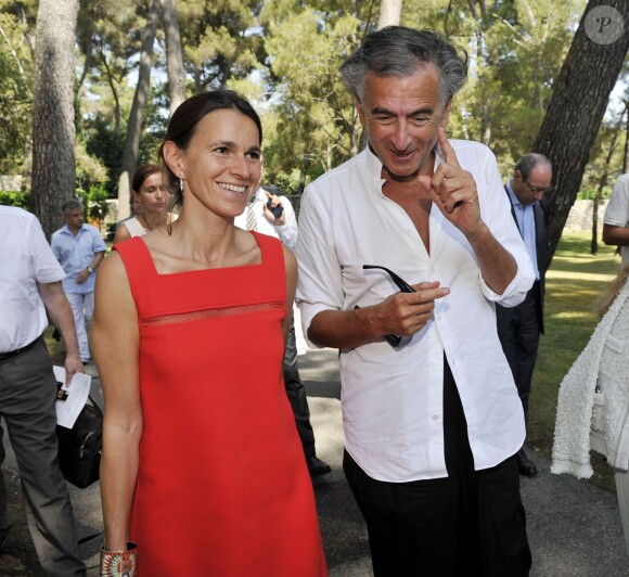 BHL et Aurélie Filippetti, la ministre de la Culture, visitent l'exposition "Les Aventures de la Vérité" qui est installée du 29 juin au 11 novembre 2013 à la célèbre Fondation Maeght sous l'impulsion du philosophe et écrivain francais Bernard-Henri Lévy commissaire de l'exposition. Le 27 juillet 2013 à Saint-Paul-de-Vence.