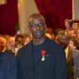 Le Président François Hollande a épinglé la légion d'honneur à Lilian Thuram le 17 septembre 2013 au Palais de l'Elysée.
