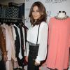 Eva Mendes célèbre le lancement de sa collection de vêtements pour New York & Company à New York, le 18 septembre 2013.