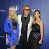 Poppy Delevingne, Peter Dundas et Clotilde Courau à la soirée de l'amfAR à Milan, le 21 septembre 2013.