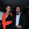 Claudia Galanti enceinte et Arnaud Mimran lors du gala de l'amfAR à Milan, le 21 septembre 2013.