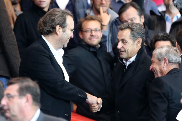 Nicolas Sarkozy et Xavier Niel lors de PSG - Monaco au Parc des Princes le 22 septembre 2013.