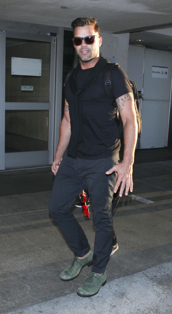 Ricky Martin arrivent avec ses fils Matteo et Valentino à l'aéroport de Los Angeles, le 23 septembre 2013.