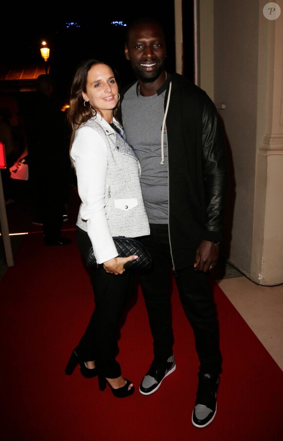 Omar Sy et sa femme Hélène lors de la soirée FIFA à Paris le 23 septembre 2013