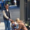 Doutzen Kroes passe la journée au parc avec son mari Sunnery James et son fils Phyllon Joy à New York, le 28 septembre 2013