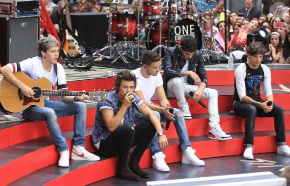 Harry Styles, Liam Payne, Louis Tomlinson, Niall Horan et Zayn Malik, le groupe One Direction a donné un concert sur le plateau de l'émission "Today" au Rockfeller Center à New York. Le 23 août 2013.