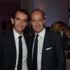 Alexandre Bompard (PDG Fnac) et Xavier Romatet (PDG Condénast) à la soirée des 80 ans d'Air France, à Paris, le 7 octobre 2013.