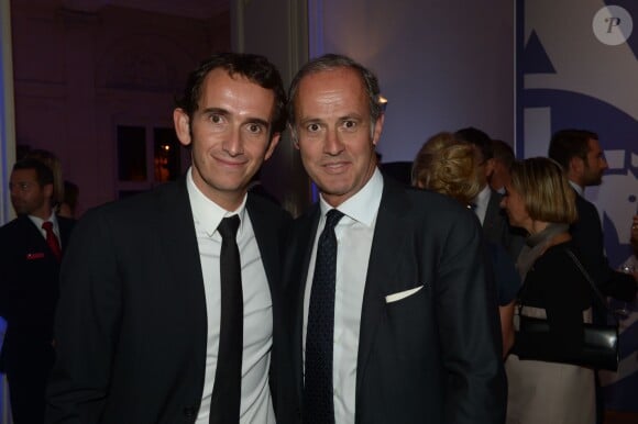 Alexandre Bompard (PDG Fnac) et Xavier Romatet (PDG Condénast) à la soirée des 80 ans d'Air France, à Paris, le 7 octobre 2013.