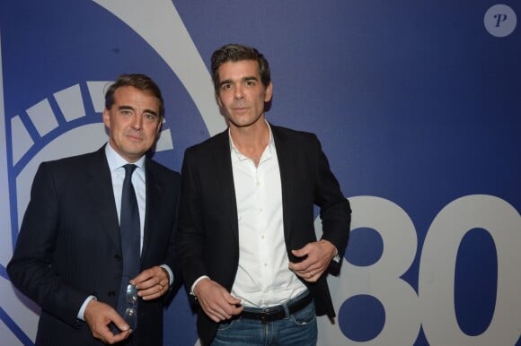 Alexandre de Juniac et Xavier De Moulins à la soirée des 80 ans d'Air France, à Paris, le 7 octobre 2013.