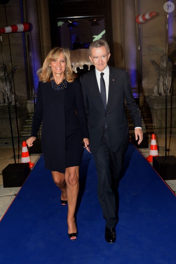 Bernard Arnault et son épouse à la soirée des 80 ans d'Air France, à Paris, le 7 octobre 2013.