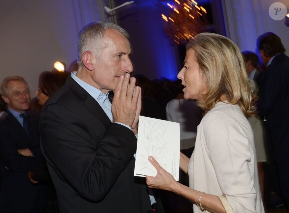 Guillaume Pepy et Claire Chazal à la soirée des 80 ans d'Air France, à Paris, le 7 octobre 2013.