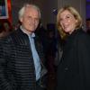 Yann Arthus-Bertrand et Michèle Laroque à la soirée des 80 ans d'Air France, à Paris, le 7 octobre 2013.